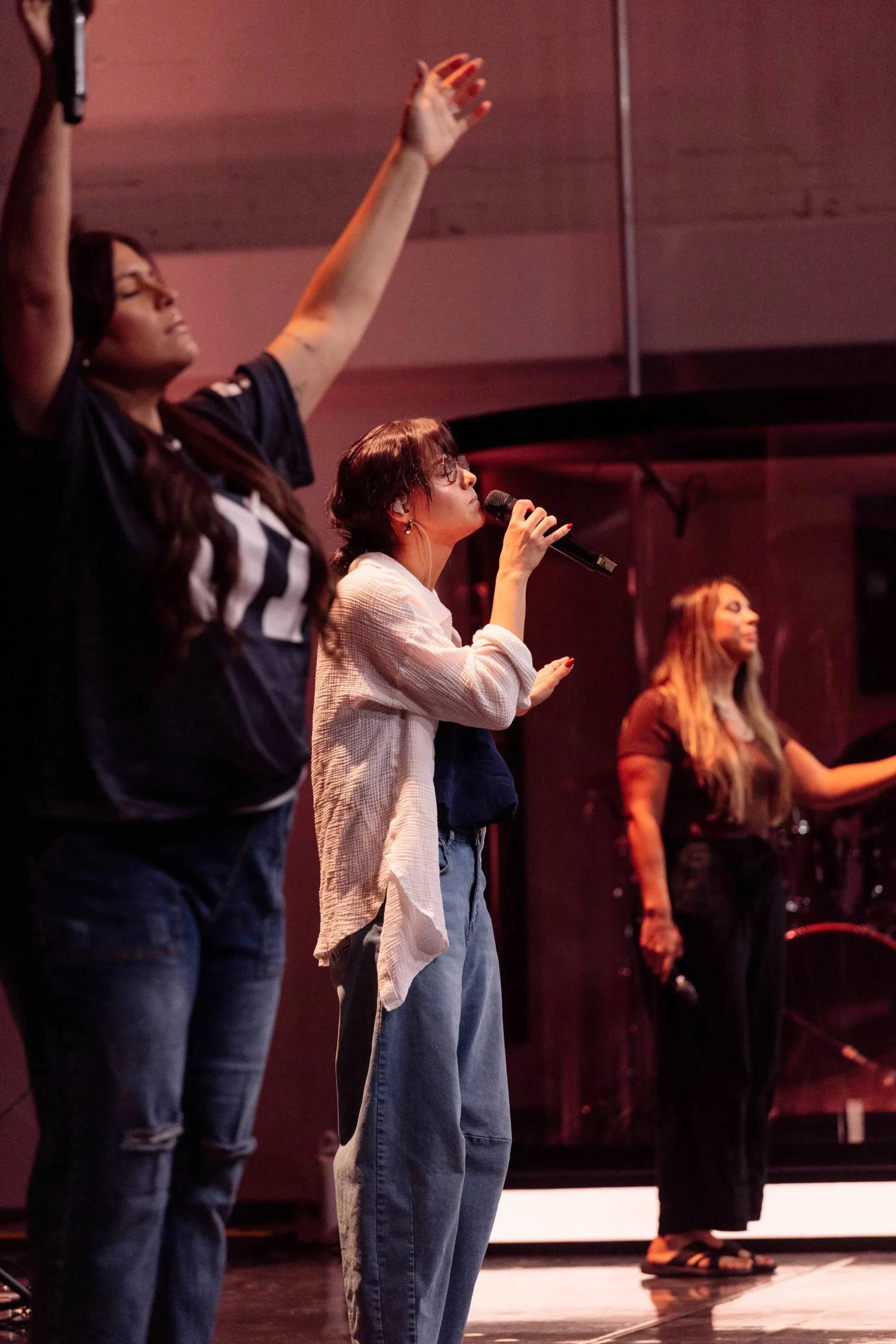 Worshippers sing together at The Sanctuary.